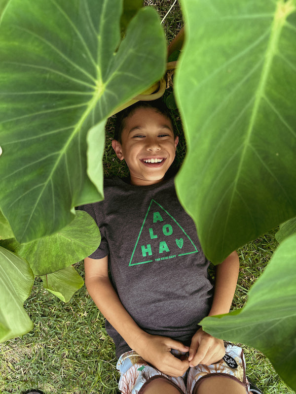 aloha tri tshirt - boy laying under kalo